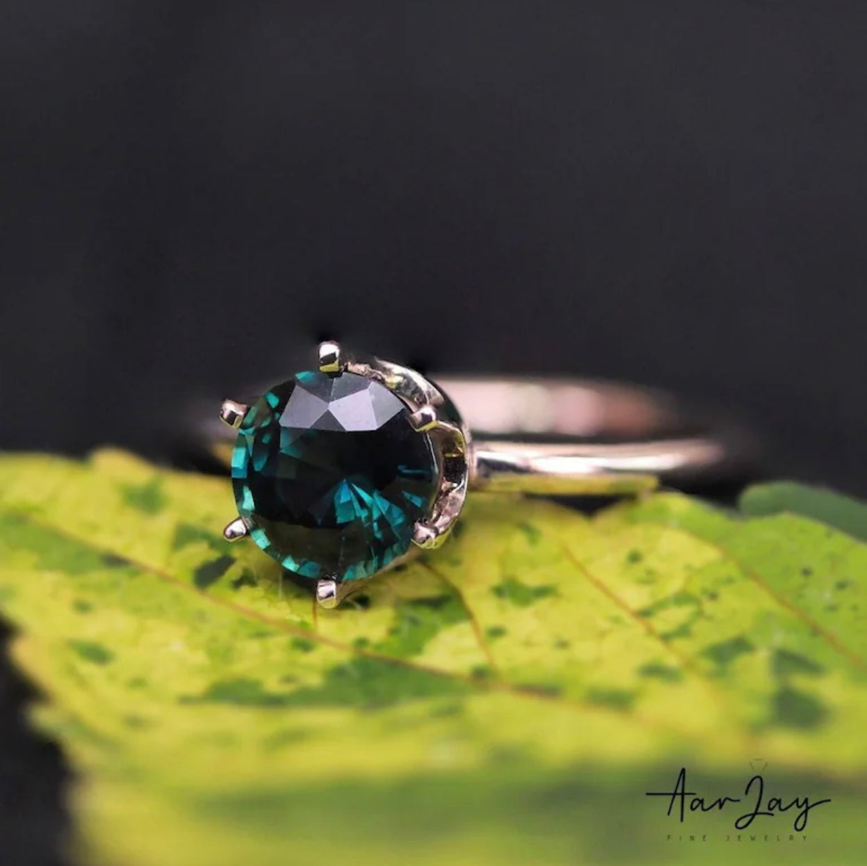 Diving into Elegance: The Timeless Allure of Teal Sapphire Engagement Rings