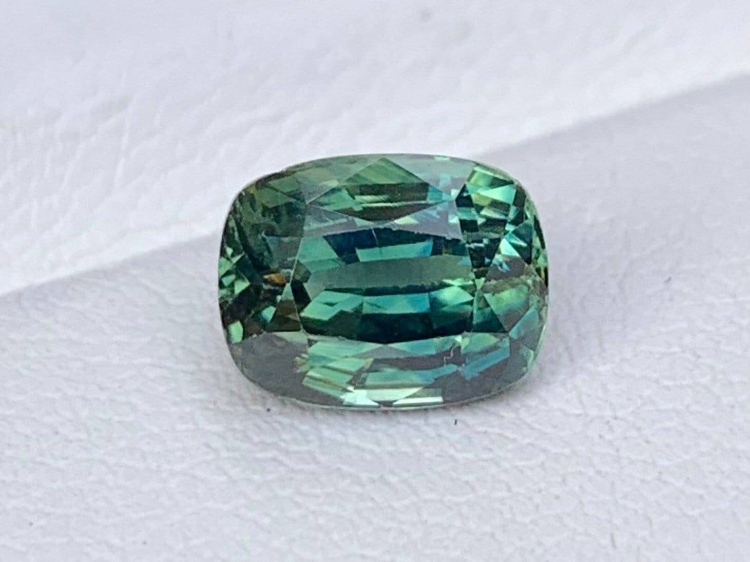 2.70 Cts Natural Teal Sapphire - (UH) - Baza Boutique 