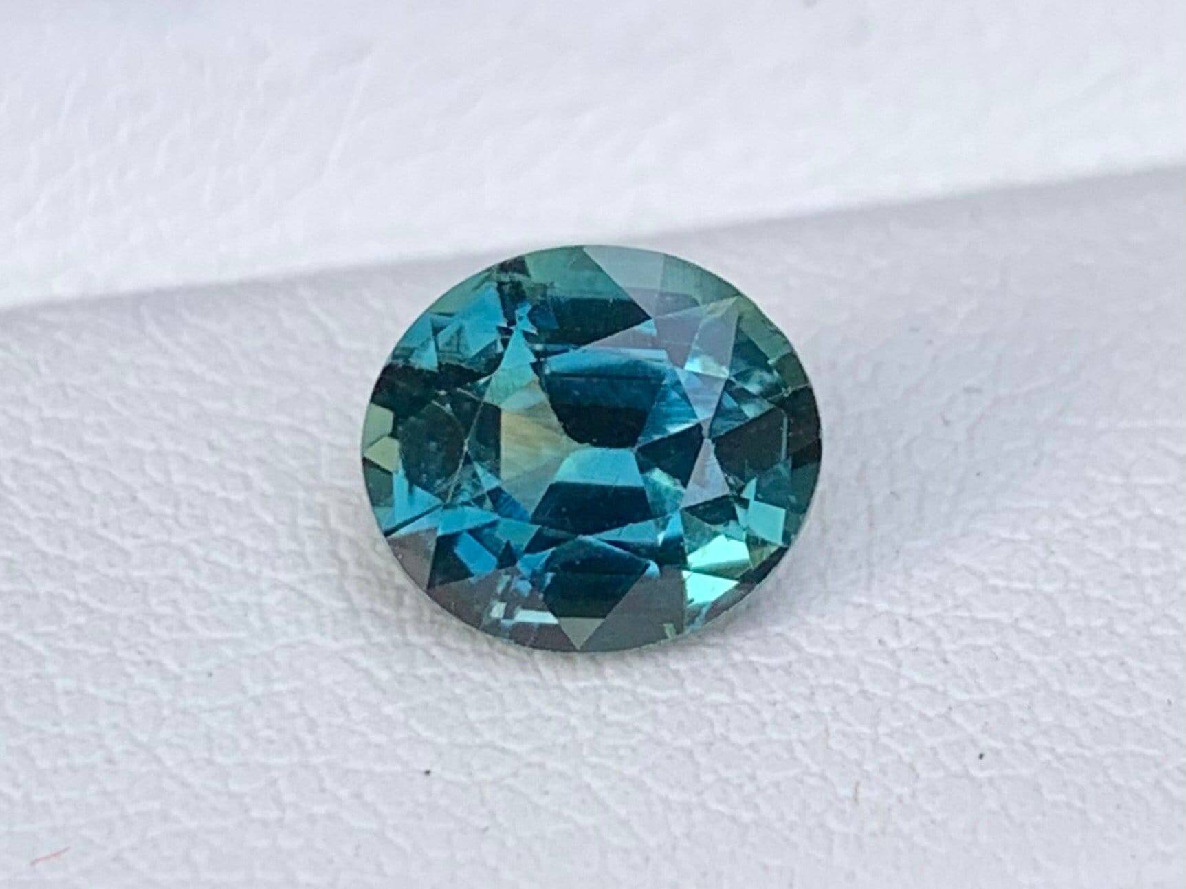 2.13 Cts Natural Teal Sapphire - (UH) - Baza Boutique 