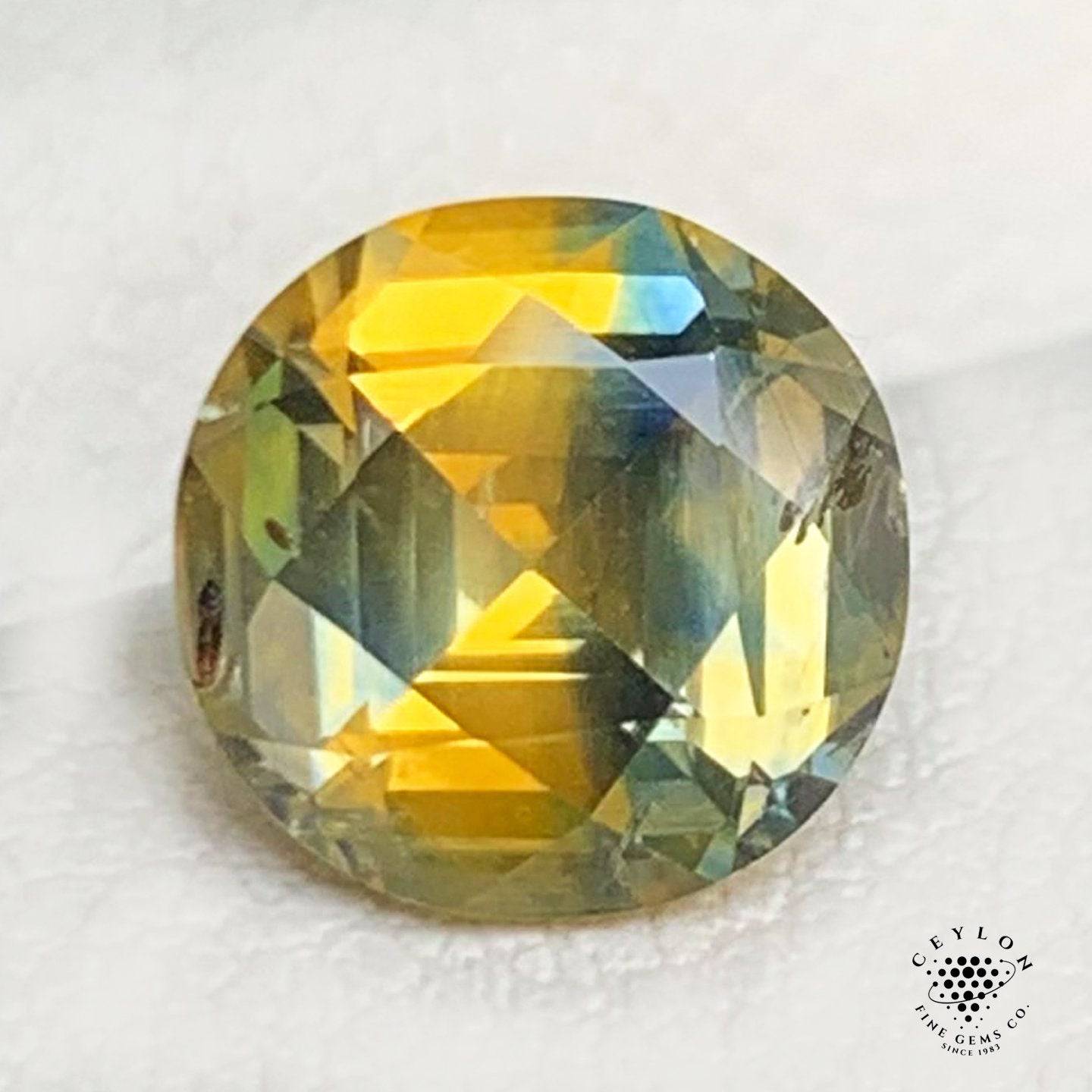 Unheated Bi-Color Sapphire - 2.16 Cts of Rare Forest Green, Orange, and Gold Elegance - Baza Boutique 